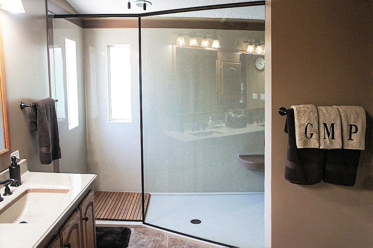 Bathroom with walk in shower and tub